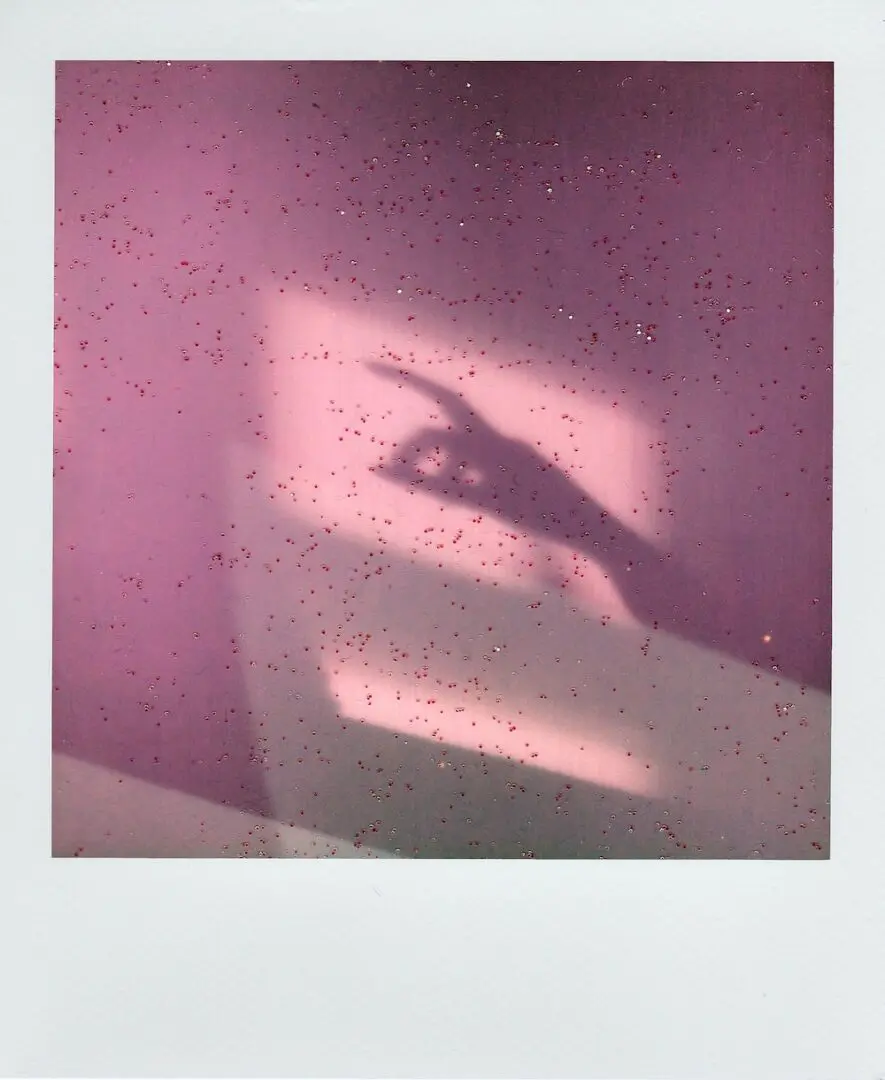 A person is casting shadow on the wall